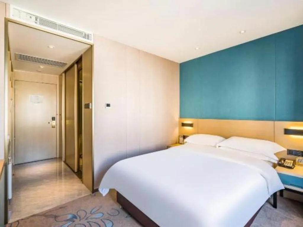 Bed in Beijing Ruyi Business Hotel