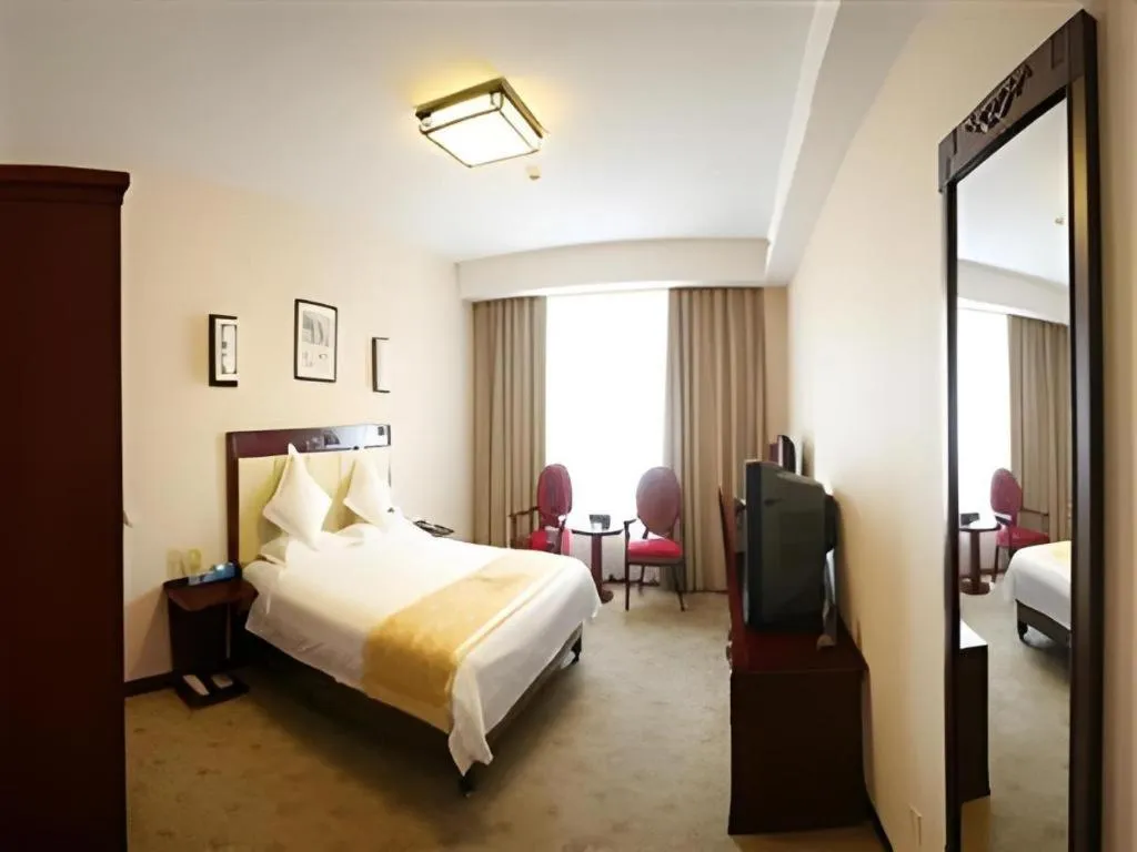 Bed in Beijing Ruyi Business Hotel