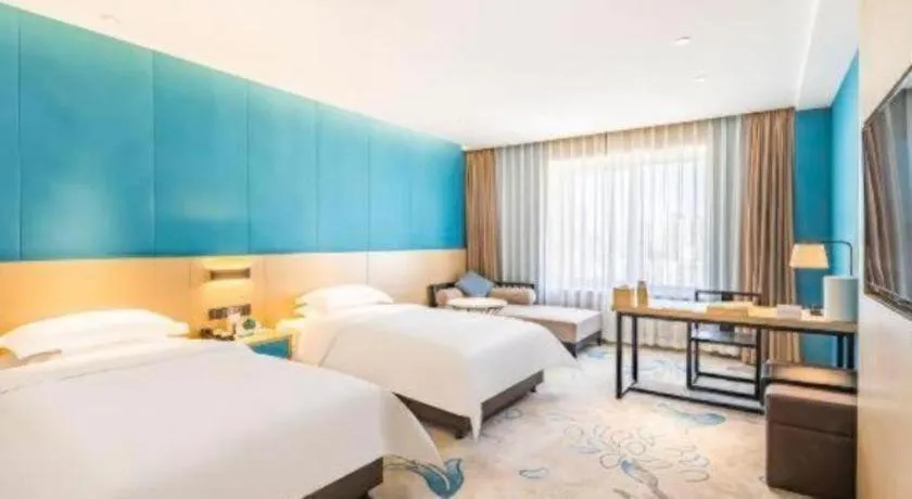 Bed in Beijing Ruyi Business Hotel