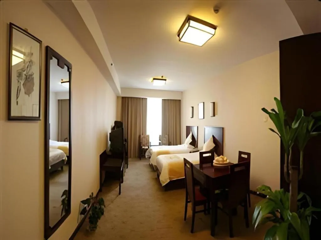 Bed in Beijing Ruyi Business Hotel