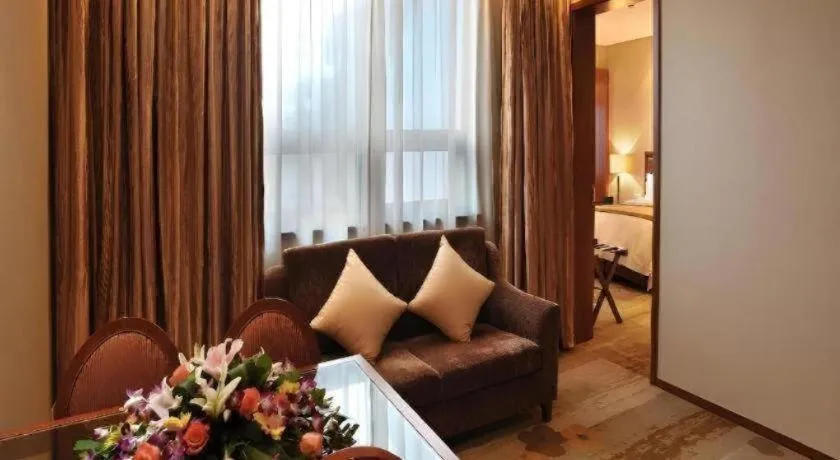 Bed in Yangzhou Hentique Huijin Resort Hotel