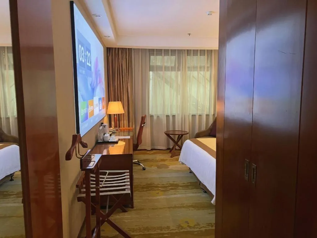 Bed in Yangzhou Hentique Huijin Resort Hotel