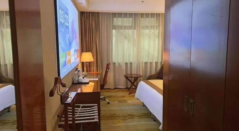 Bed in Yangzhou Hentique Huijin Resort Hotel