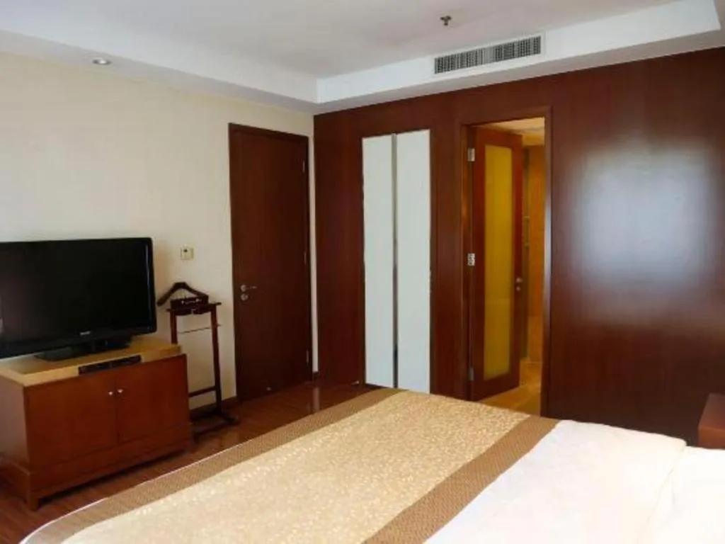 Bed in Yangzhou Hentique Huijin Resort Hotel