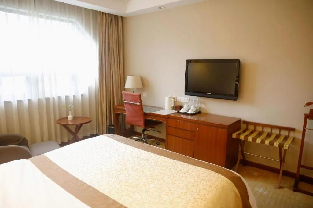 Bed in Yangzhou Hentique Huijin Resort Hotel