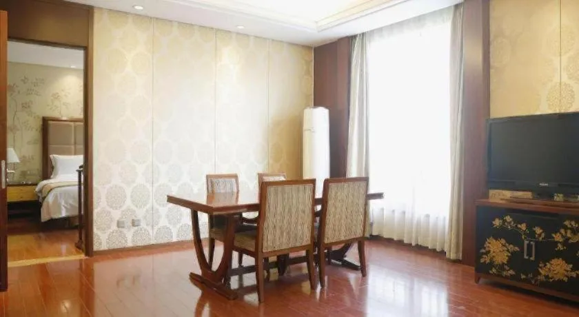 Bed in Yangzhou Hentique Huijin Resort Hotel