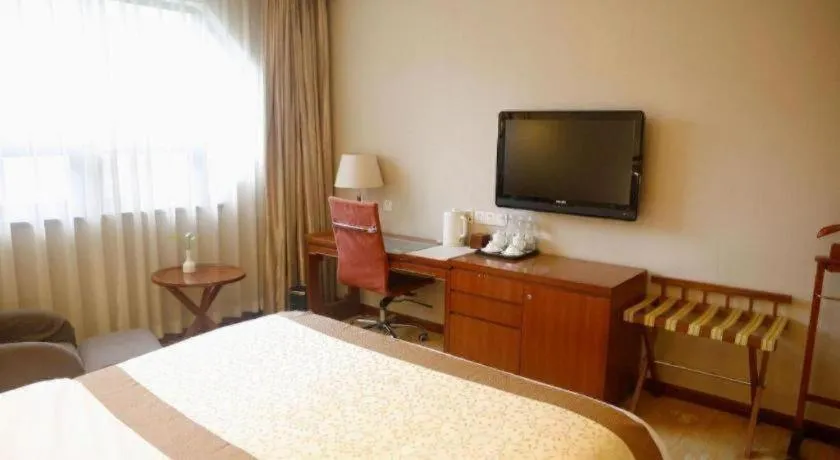 Bed in Yangzhou Hentique Huijin Resort Hotel