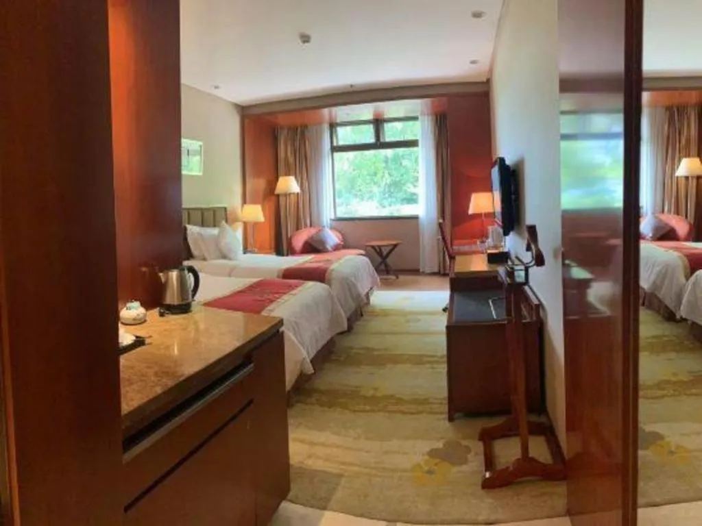 Bed in Yangzhou Hentique Huijin Resort Hotel