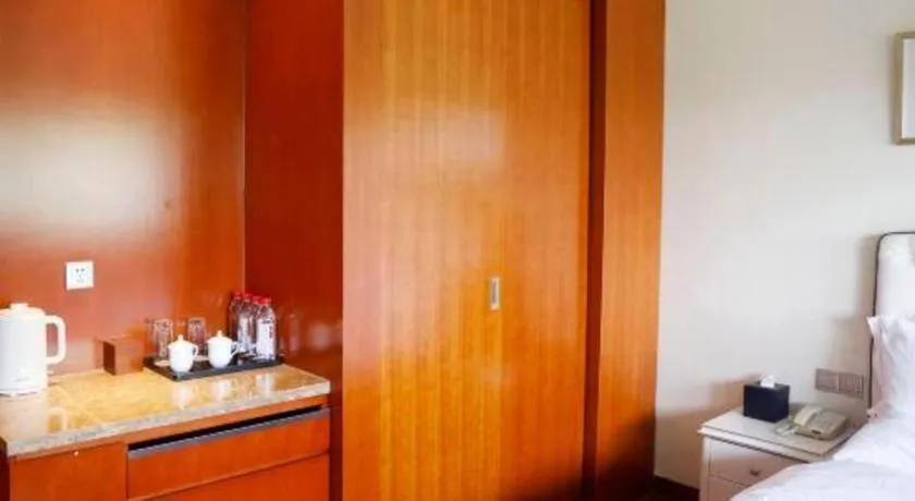 Bed in Yangzhou Hentique Huijin Resort Hotel