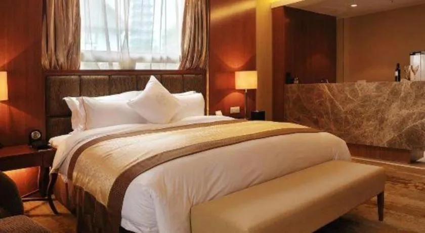 Bed in Yangzhou Hentique Huijin Resort Hotel