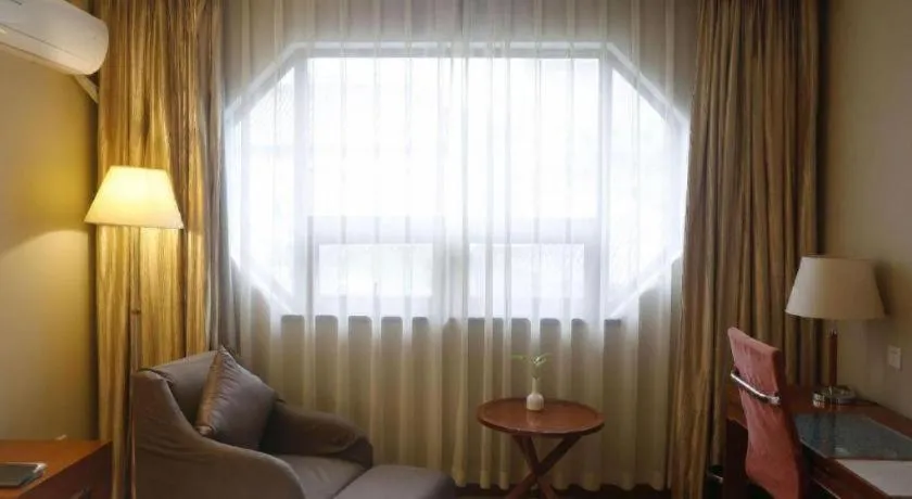 Bed in Yangzhou Hentique Huijin Resort Hotel