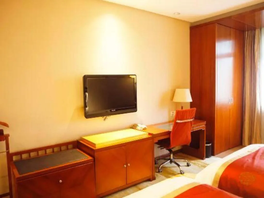 Bed in Yangzhou Hentique Huijin Resort Hotel