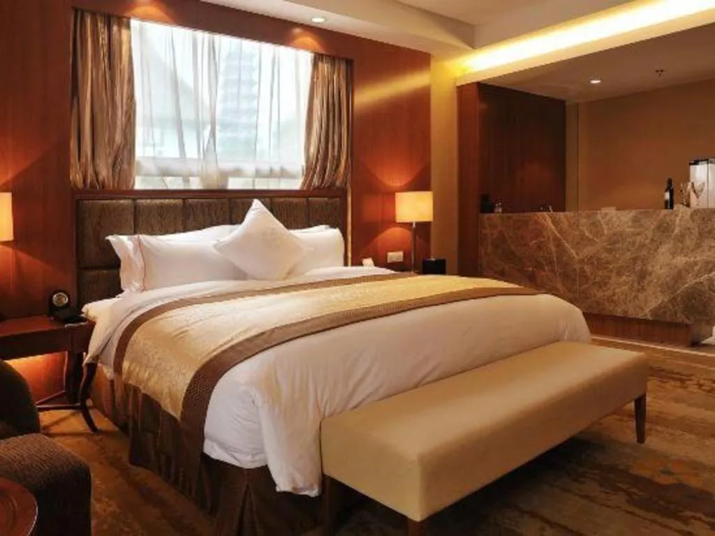 Bed in Yangzhou Hentique Huijin Resort Hotel