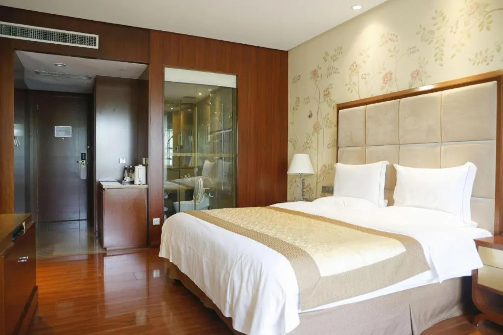 Bed in Yangzhou Hentique Huijin Resort Hotel