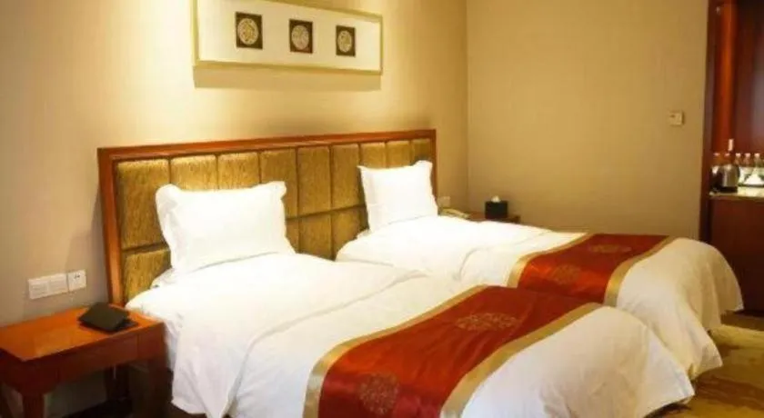 Bed in Yangzhou Hentique Huijin Resort Hotel