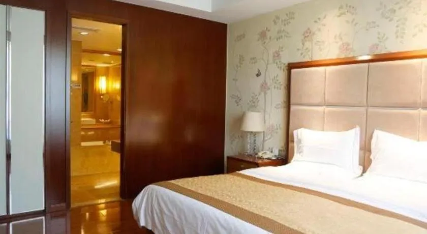 Bed in Yangzhou Hentique Huijin Resort Hotel