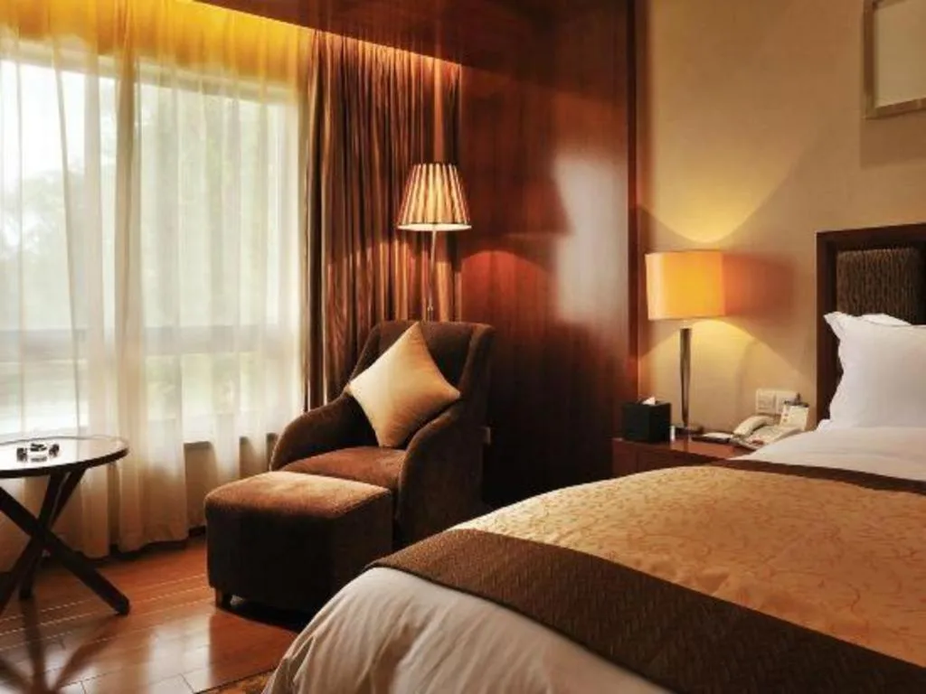 Bed in Yangzhou Hentique Huijin Resort Hotel