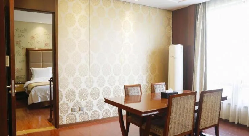 Bed in Yangzhou Hentique Huijin Resort Hotel