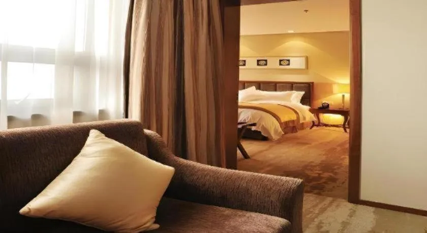 Bed in Yangzhou Hentique Huijin Resort Hotel