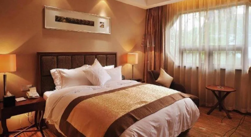 Bed in Yangzhou Hentique Huijin Resort Hotel