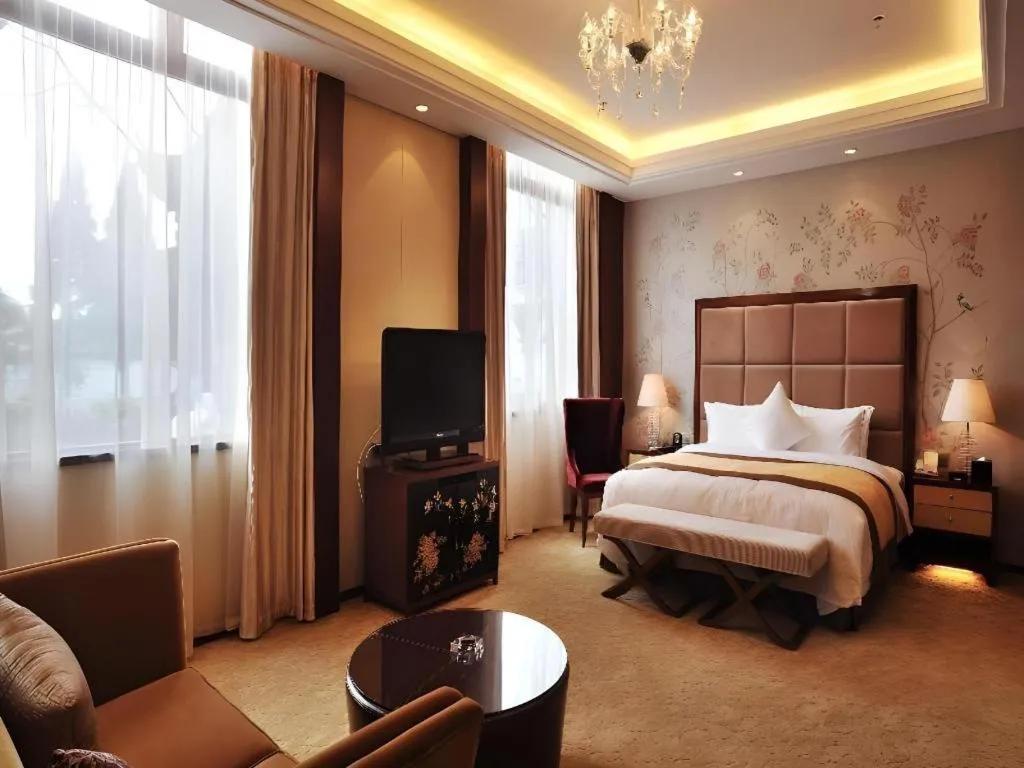 Bed in Yangzhou Hentique Huijin Resort Hotel