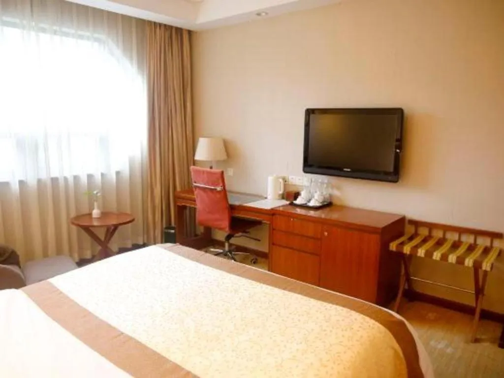 Bed in Yangzhou Hentique Huijin Resort Hotel