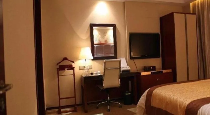 Bed in Yangzhou Hentique Huijin Resort Hotel