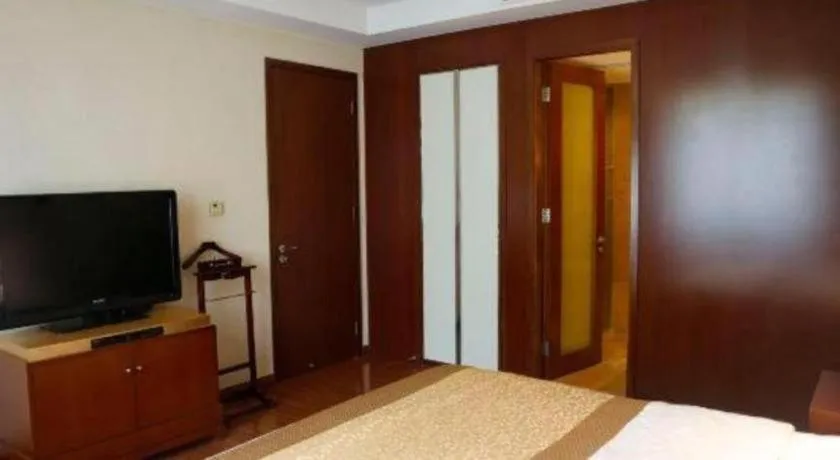 Bed in Yangzhou Hentique Huijin Resort Hotel