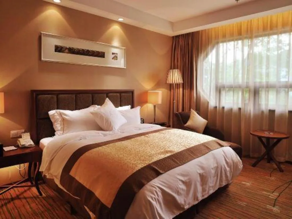 Bed in Yangzhou Hentique Huijin Resort Hotel