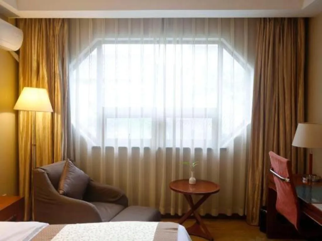 Bed in Yangzhou Hentique Huijin Resort Hotel