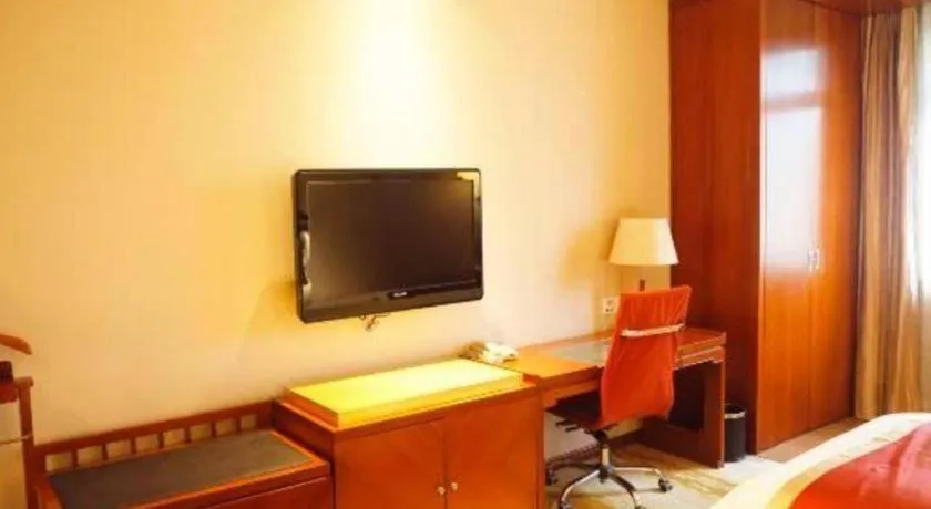 Bed in Yangzhou Hentique Huijin Resort Hotel