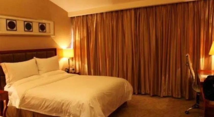 Bed in Yangzhou Hentique Huijin Resort Hotel