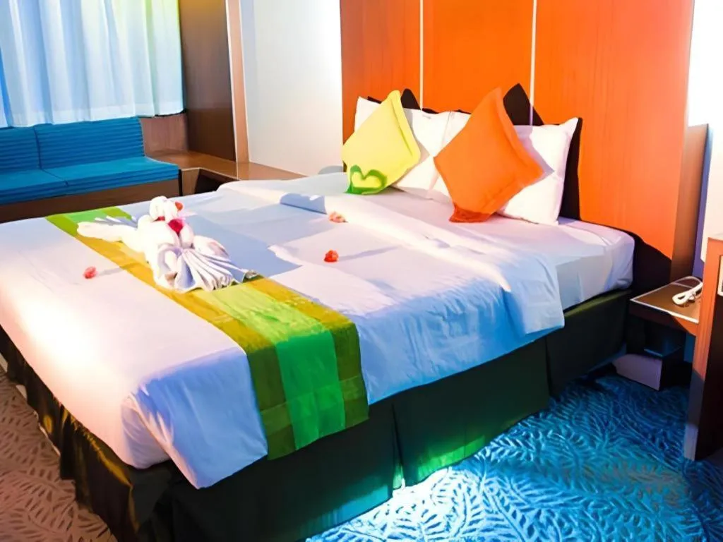 Bed in V-One Hotel Korat