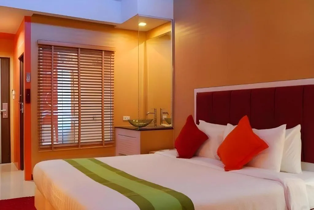 Bed in V-One Hotel Korat