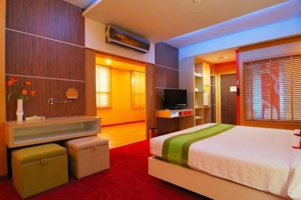 Bed in V-One Hotel Korat