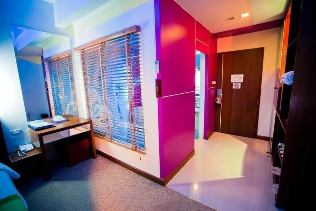 Bed in V-One Hotel Korat