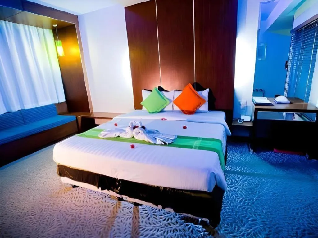 Bed in V-One Hotel Korat