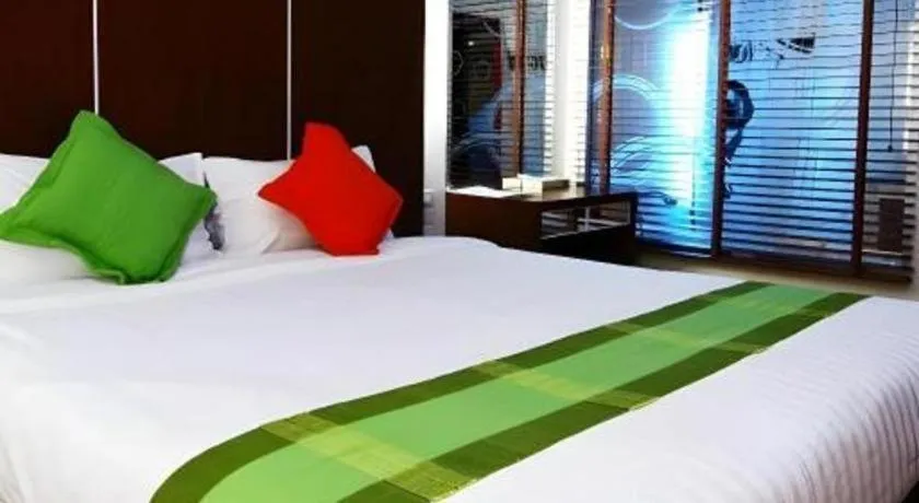 Bed in V-One Hotel Korat