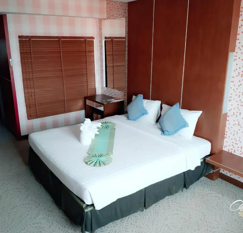Bed in V-One Hotel Korat