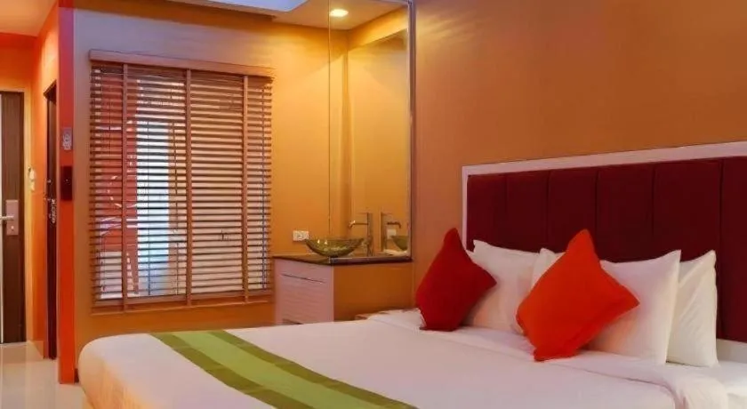 Bed in V-One Hotel Korat