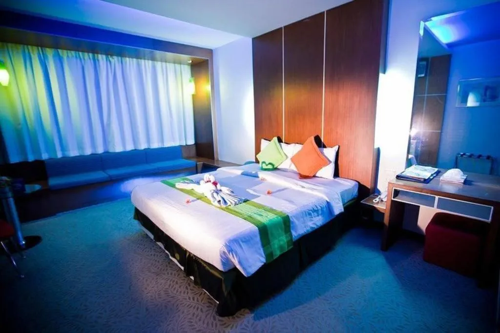 Bed in V-One Hotel Korat