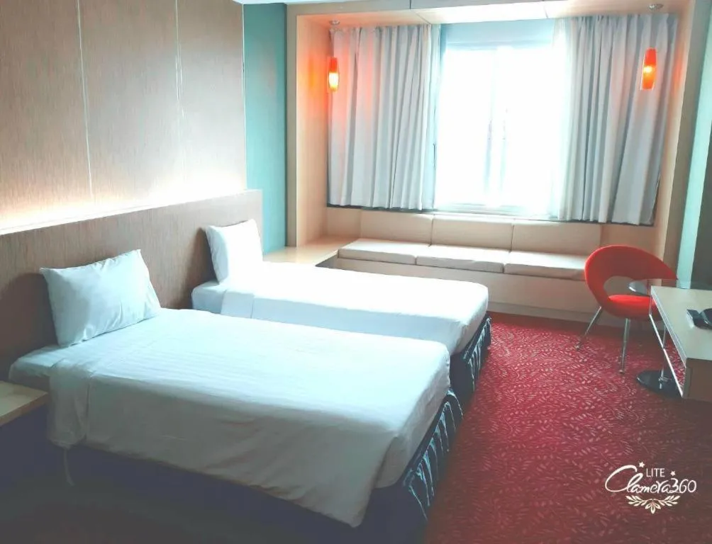 Bed in V-One Hotel Korat