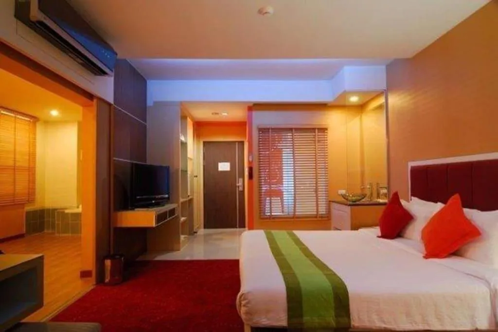 Bed in V-One Hotel Korat