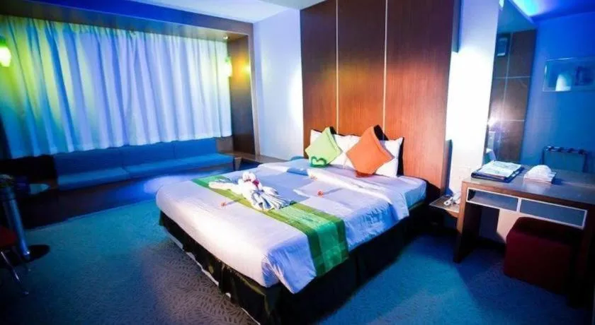 Bed in V-One Hotel Korat