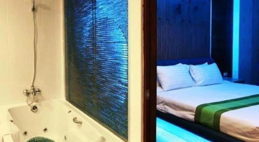 Bed in V-One Hotel Korat