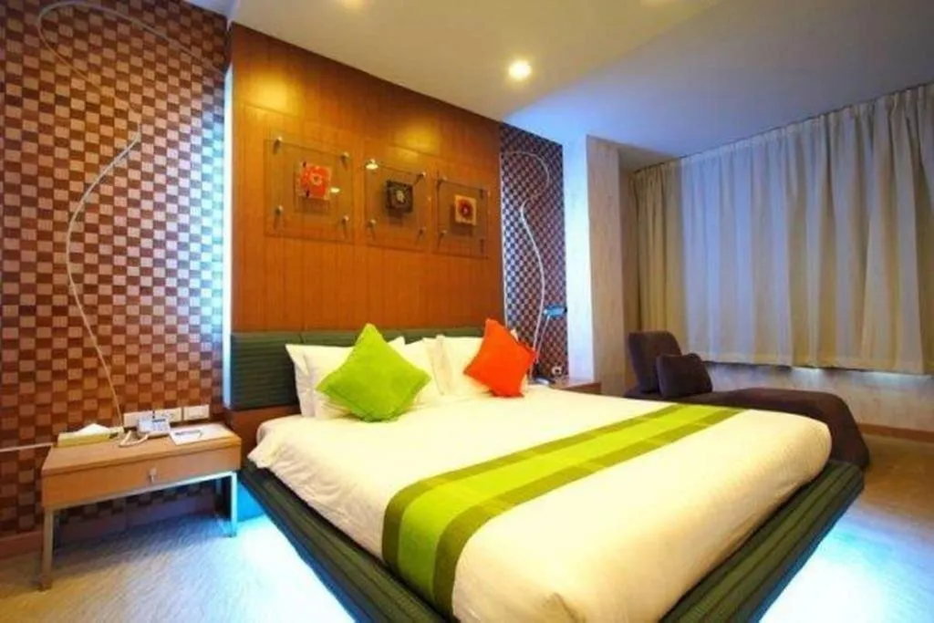 Bed in V-One Hotel Korat