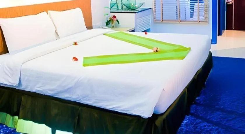Bed in V-One Hotel Korat