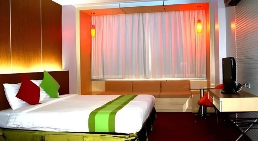 Bed in V-One Hotel Korat