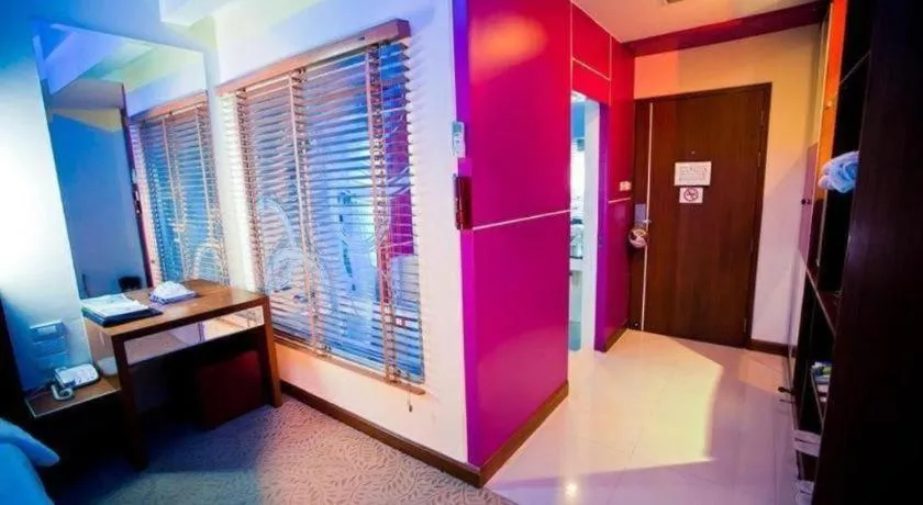 Bed in V-One Hotel Korat