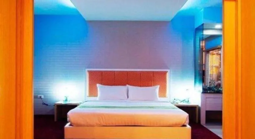 Bed in V-One Hotel Korat